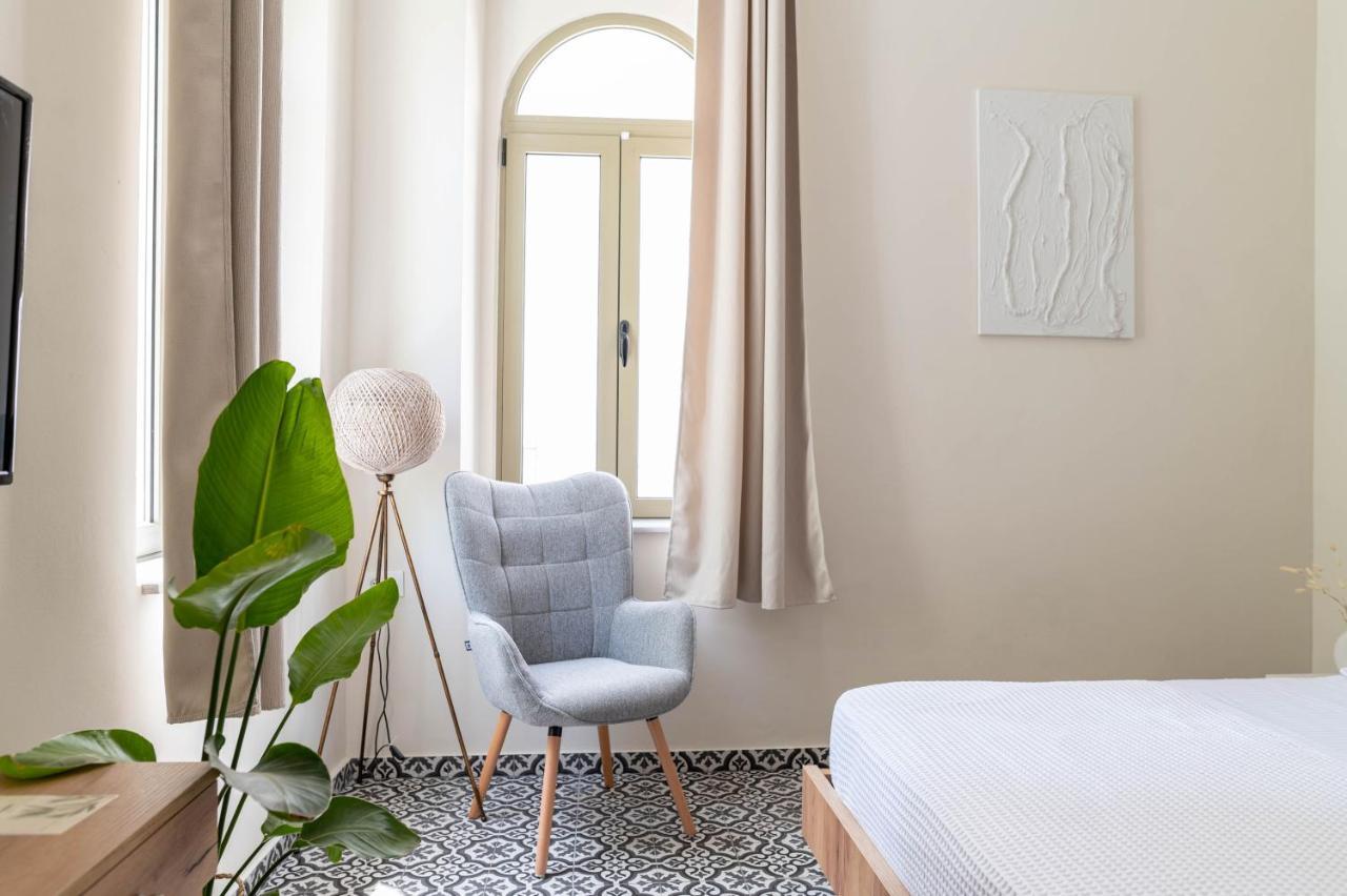 Kosnian City Suites Buitenkant foto