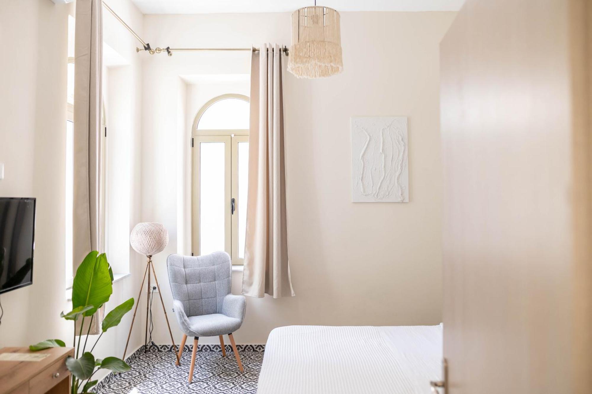 Kosnian City Suites Buitenkant foto